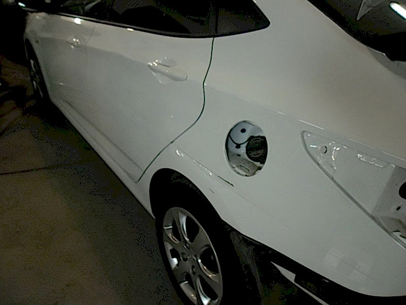 Hyundai Solaris. Повреждение заднего левого крыла и двери.