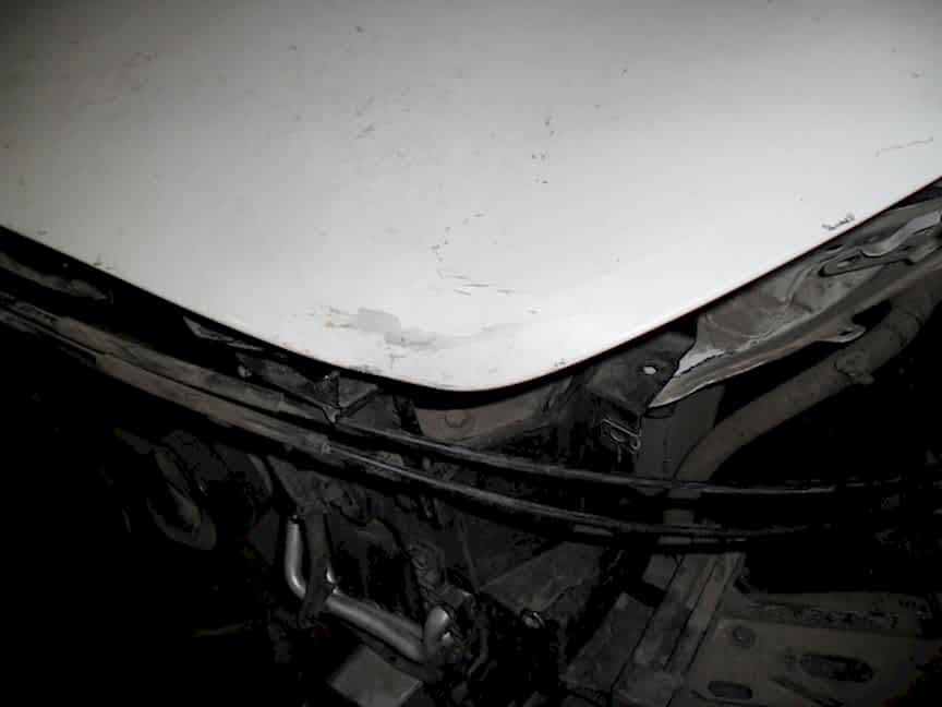 Infiniti FX37. Повреждение капота.