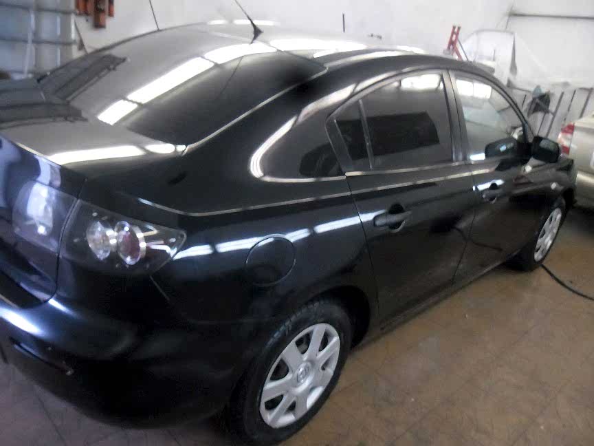 Mazda после ремонта правой части автомобиля.