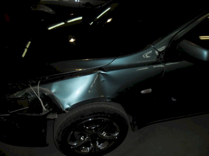 Mitsubishi Lancer Повреждение передней части автомобиля.