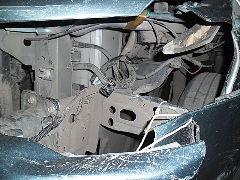 Mitsubishi Lancer Повреждение передней части автомобиля.